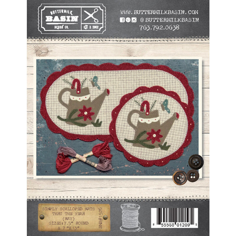 The front of the Simply Scalloped Mats May pattern showing the finished mats side by side with the same wool applique watering can, flower, and butterfly.