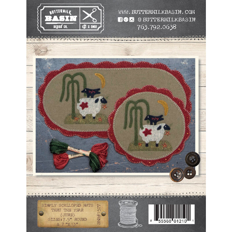 The front of the Simply Scalloped Mats June pattern showing the finished mats side by side with the same wool applique sheep, crow and tree.