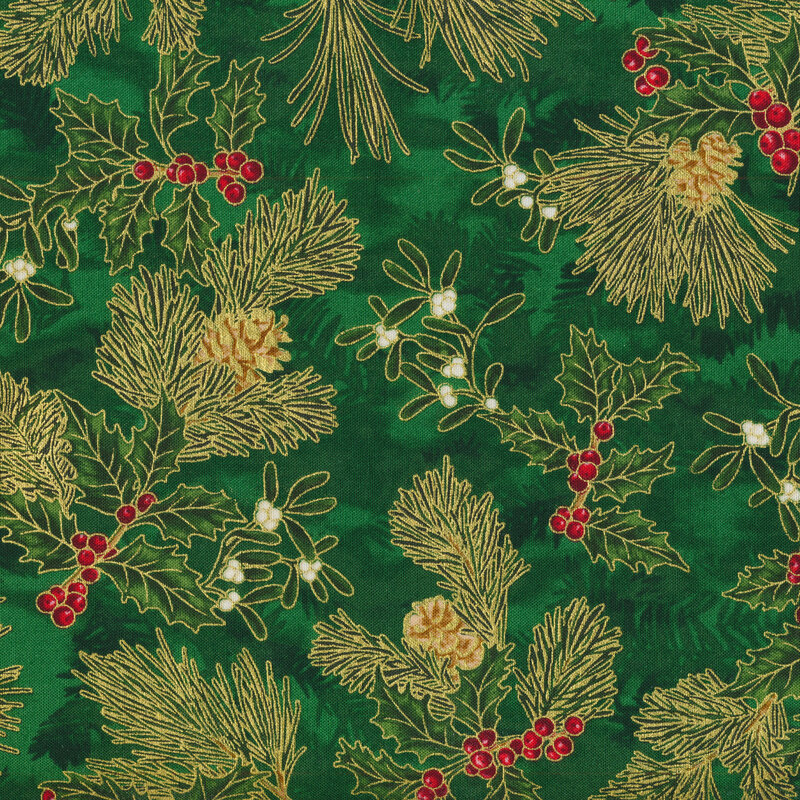 Pine branches and holly on green