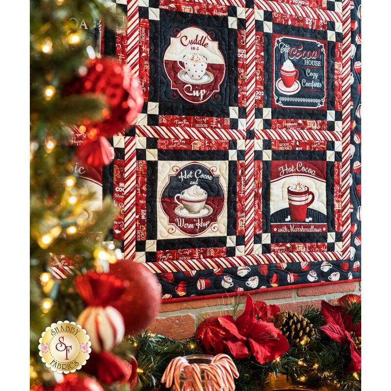Nine block quilt featuring cocoa mugs in red, black, and white.