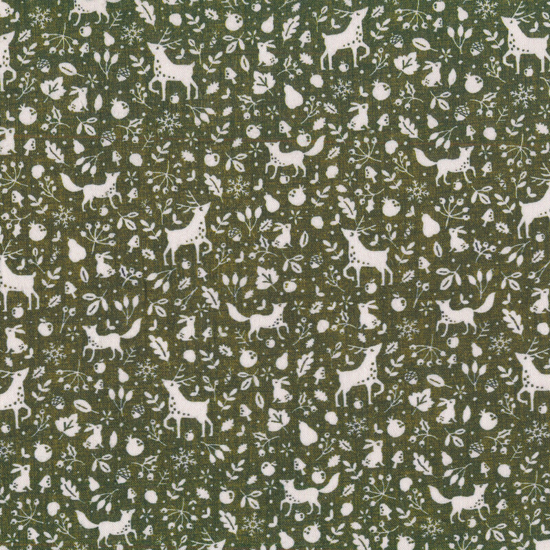 Green fabric with white winter animals, leaves, vines, nuts, and snowflakes all over