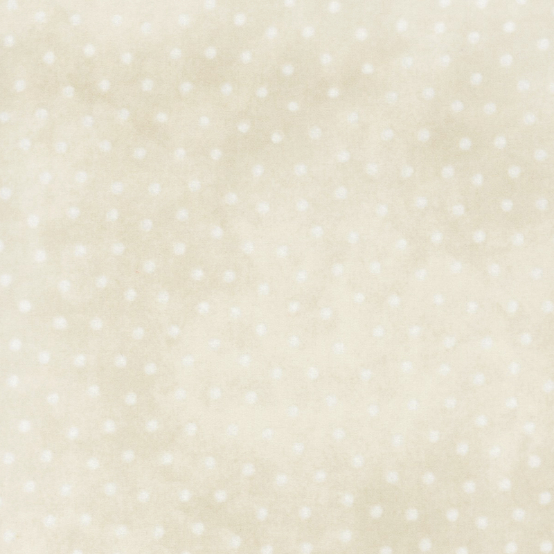 Mottled cream polka dot flannel fabric