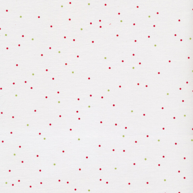 Fabric with small red and green pin dots all over a white background