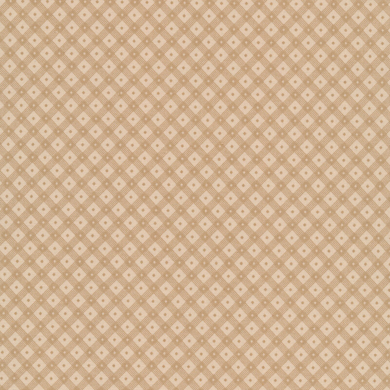 Tonal fabric of pin dots throughout a tan gingham print on a tan background.
