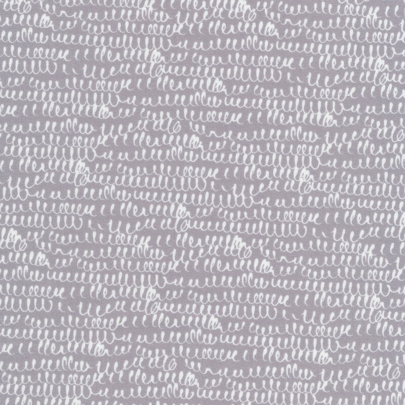 Fabric of white squiggle lines on a gray background