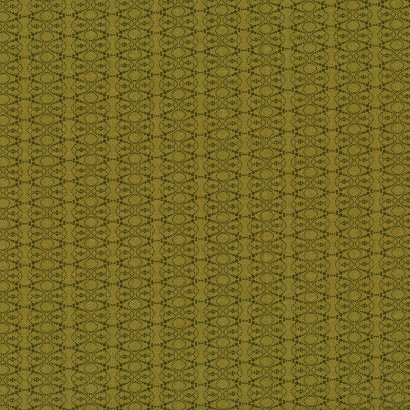 Fabric of a geometric ellipse pattern made out of dots on a green background