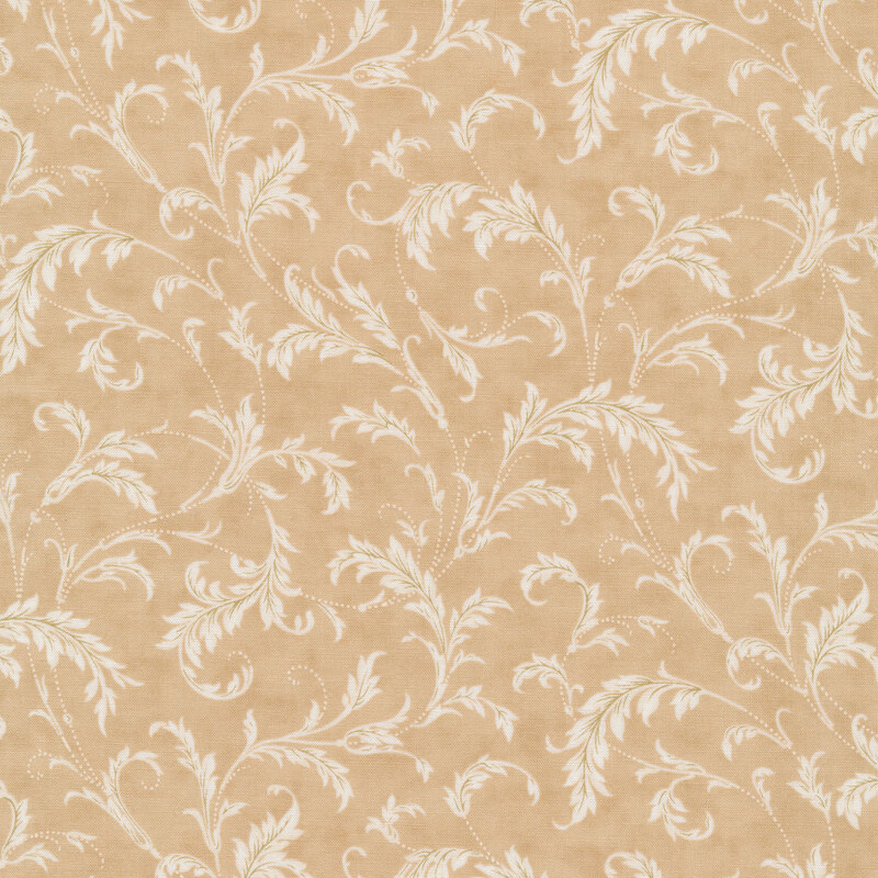 Fabric of flowing swirls of vines and leaves on a tan background