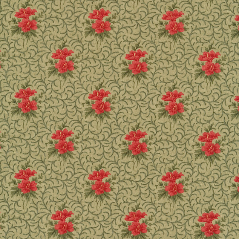 Fabric of a swirling vine pattern and flowers on a green background