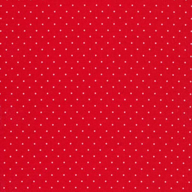 Red fabric with small white polka dots all over