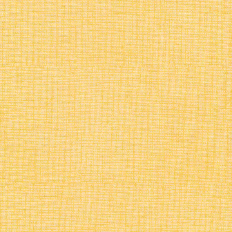 Light yellow textured fabric