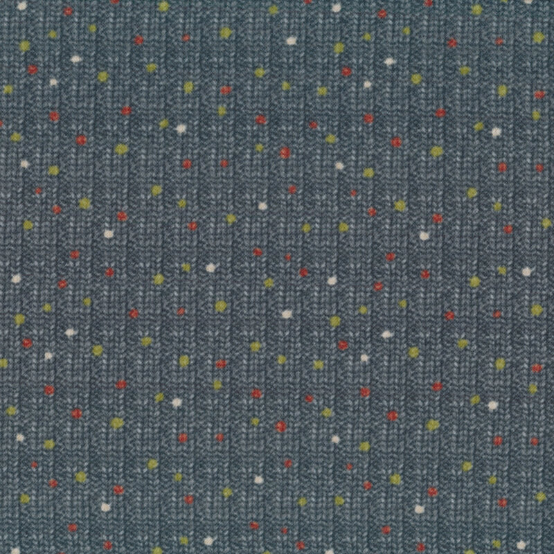 Flannel fabric of a knit print and colored polka dots on a blue gray background