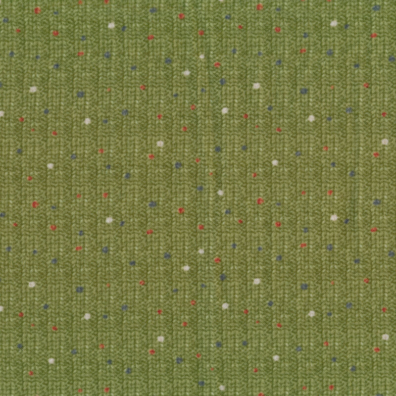 Flannel fabric of a knit print and colored polka dots on a green background