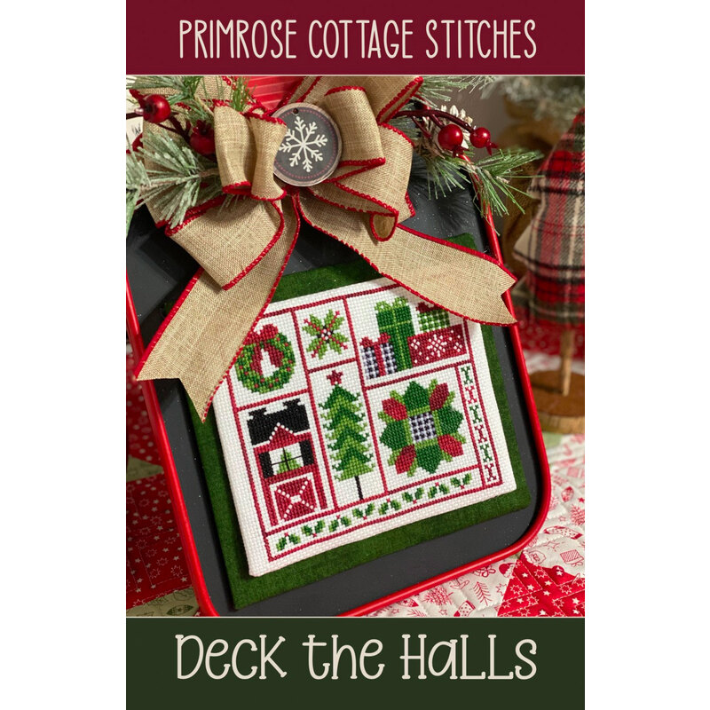 The front of the Deck The Halls Cross Stitch pattern by Primrose Cottage showing the finished project.