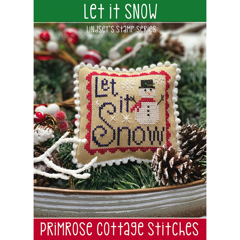 The front of the Let it Snow Cross Stitch pattern by Primrose Cottage showing the finished project.