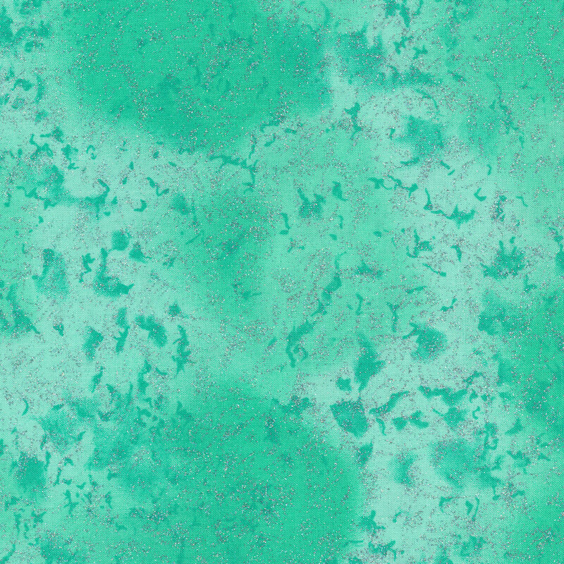 Tonal light teal fabric with mottling and metallic glitter accents
