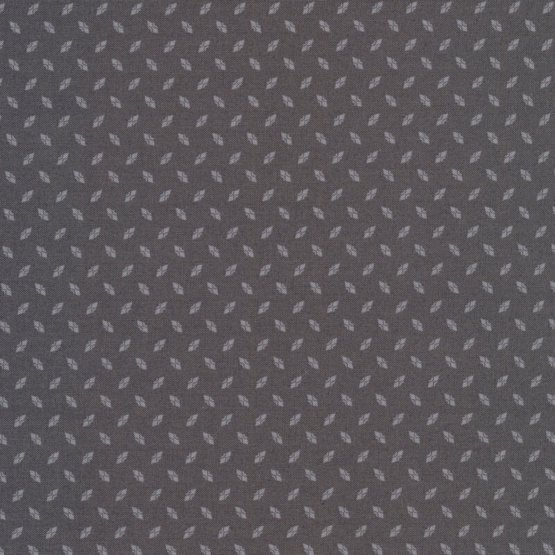 Grey fabric with a textured metal pattern