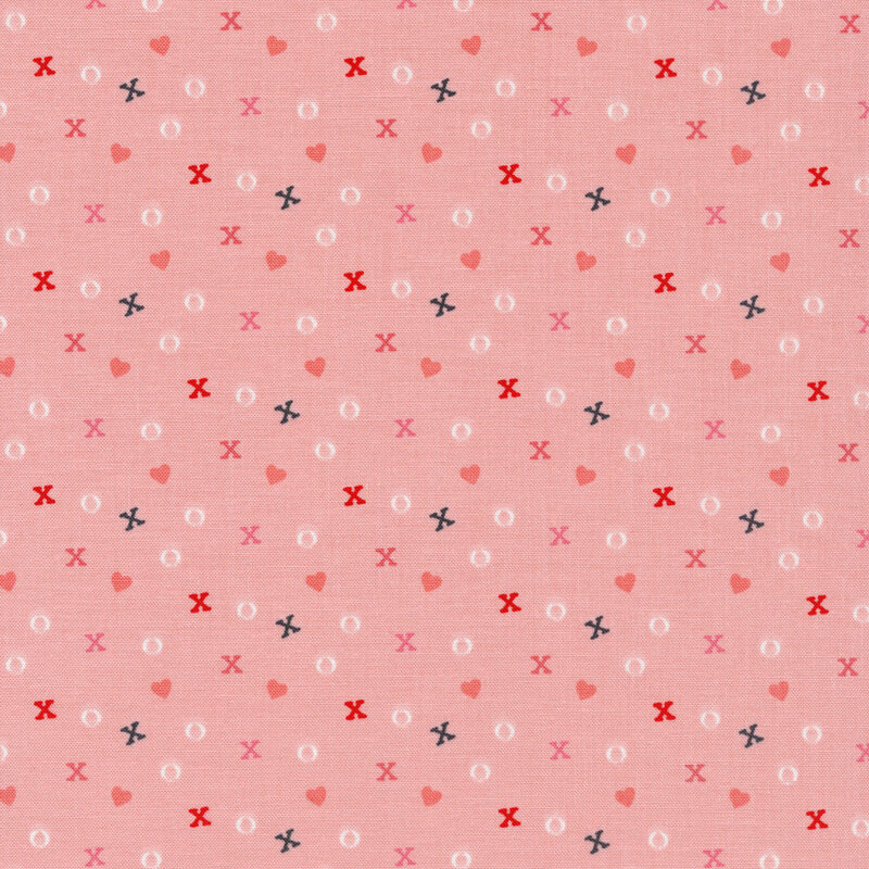 Fabric of scattered Xs, Os, and small hearts on a light pink background