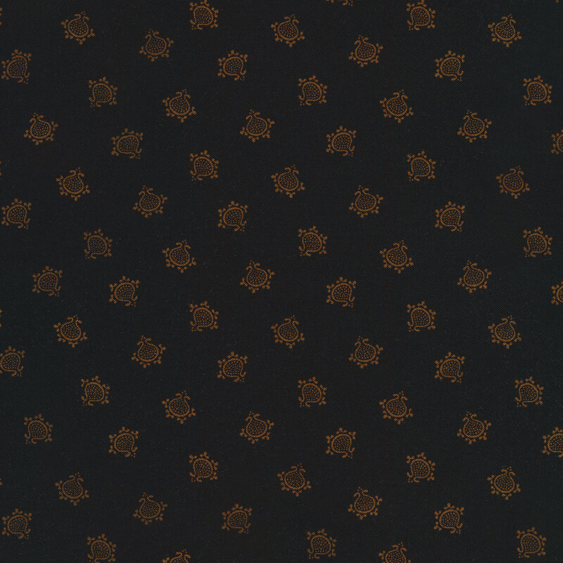 ditsy golden brown pattern scattered all over a black fabric background