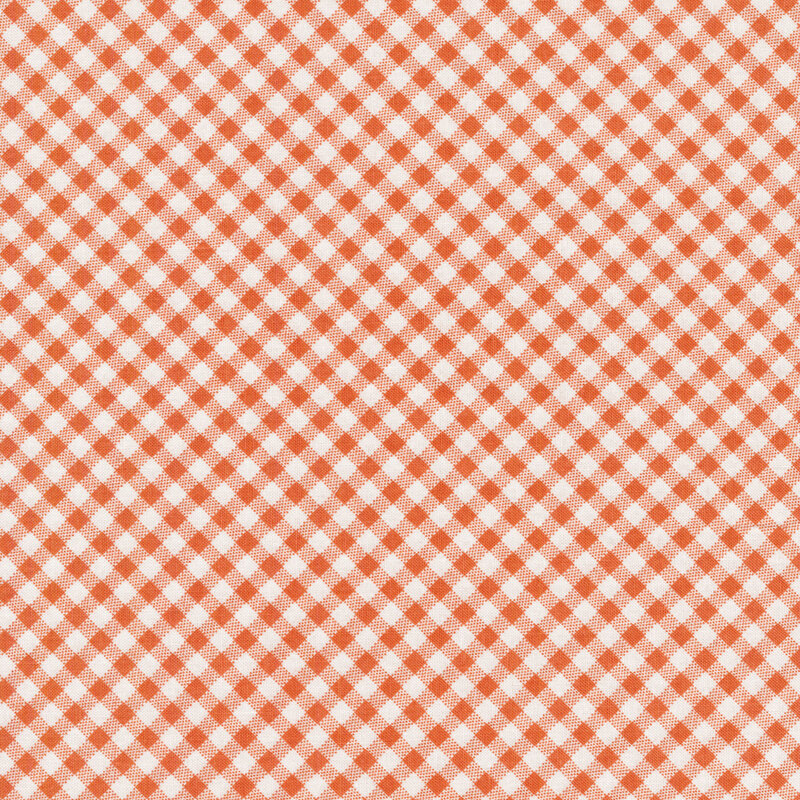 Fabric of a small diagonal orange gingham print