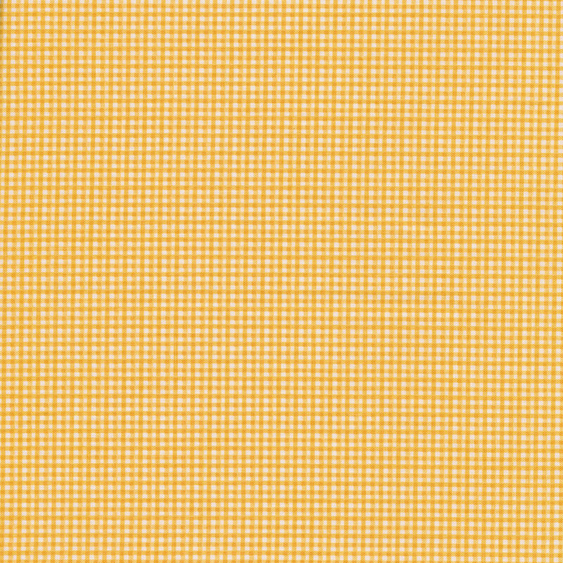 Fabric of a micro yellow gingham print
