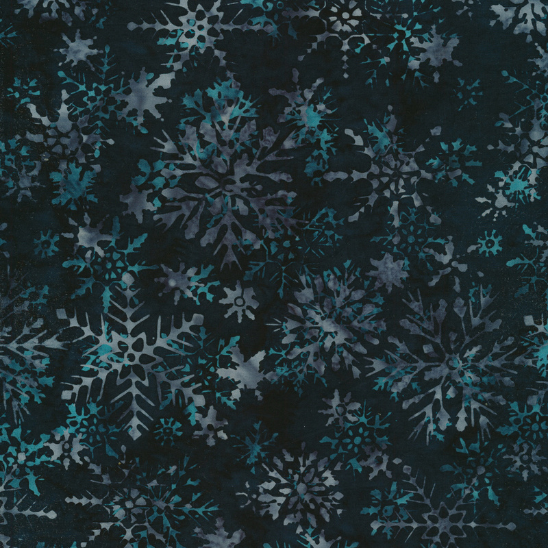 Dark batik fabric with aqua mottled snowflakes all over