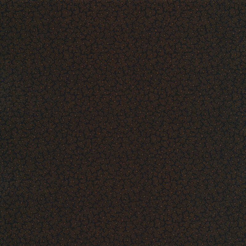 polka dots maze all over a black fabric background