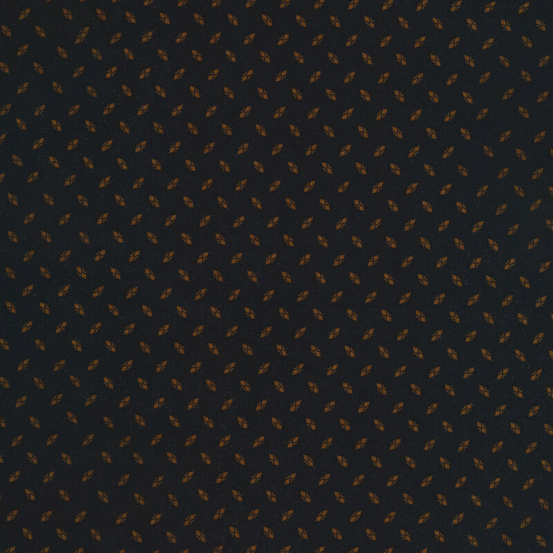 small golden shields all over a black fabric background 
