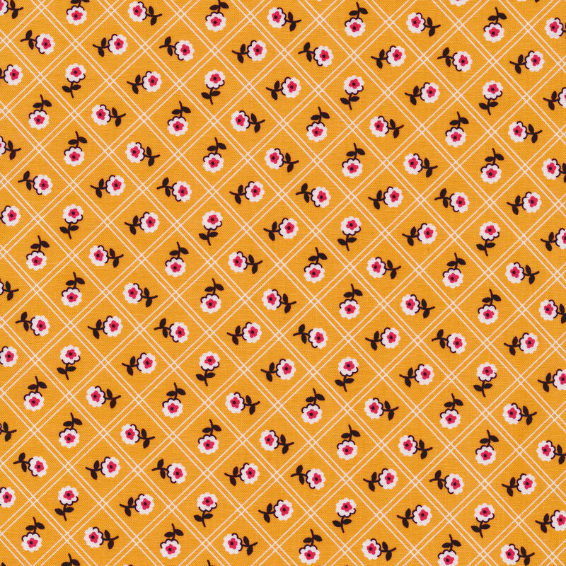 Fabric features a thin, double striped lattice pattern filled with flowers on a yellow background