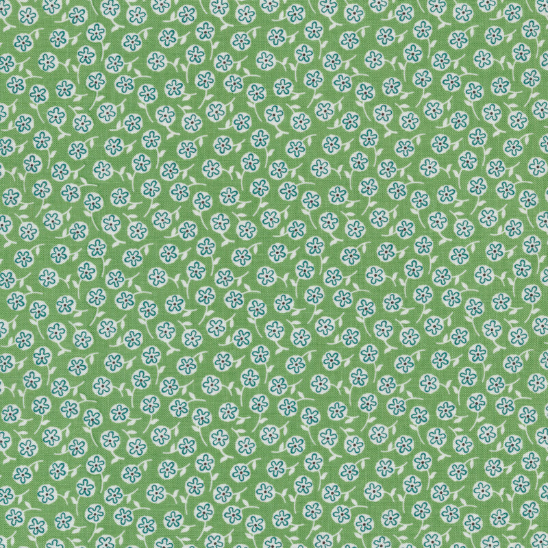 Fabric of small ditsy white flowers on a green background