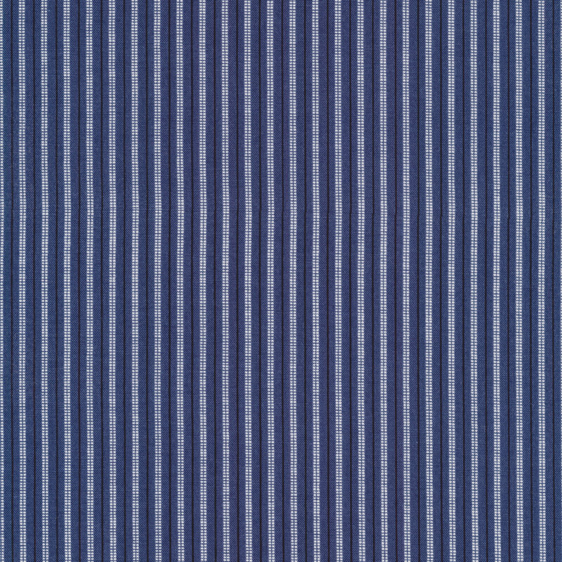 Striped fabric of large white and small black stripes on a blue background