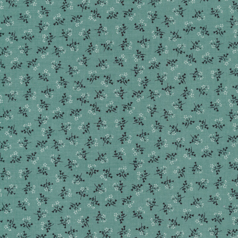 Ditsy fabric with sprigs of flowers on a dark teal background