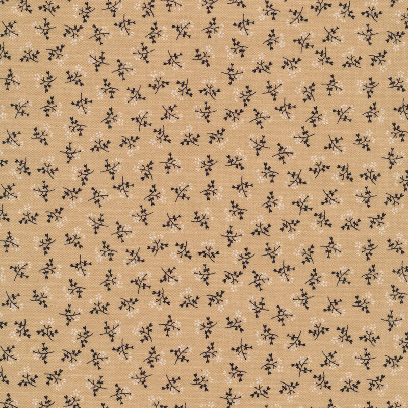 Ditsy fabric with sprigs of flowers on a tan background