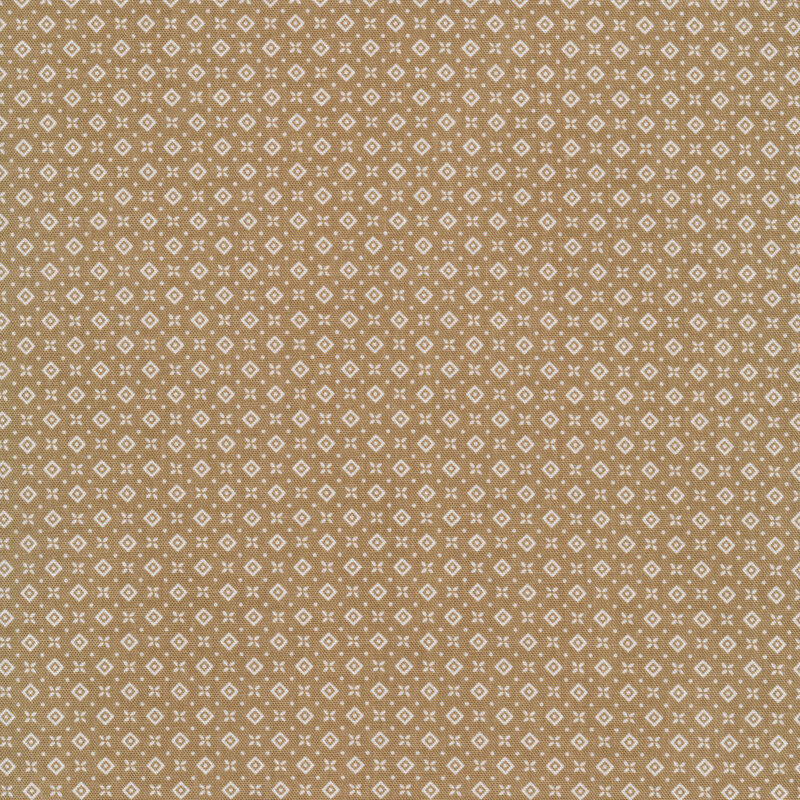 Fabric of a geometric diamond, dot, and flower print on a brown background