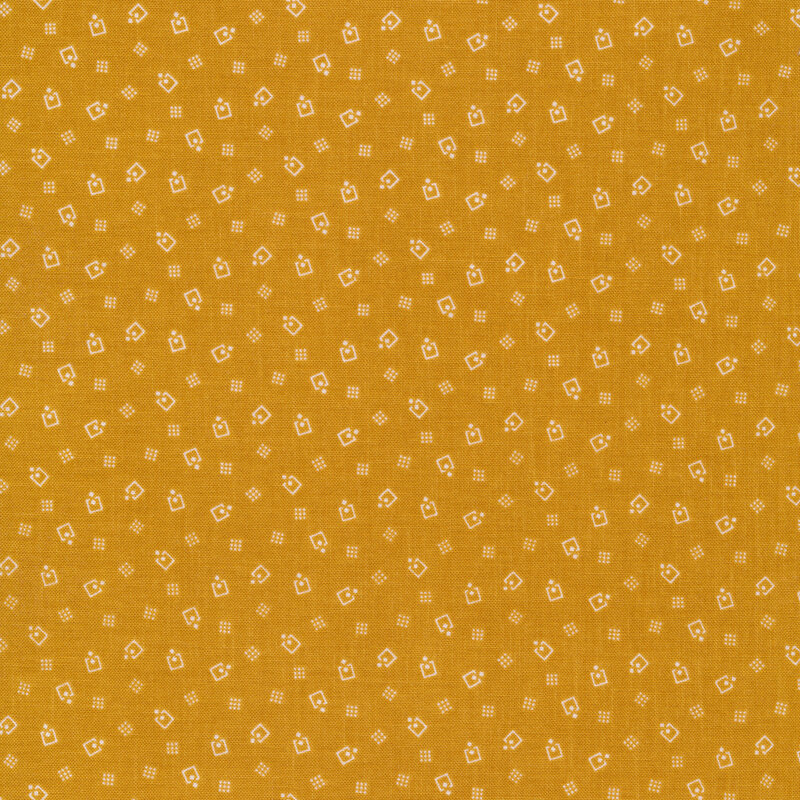 Fabric of scattered geometric designs on a yellow background