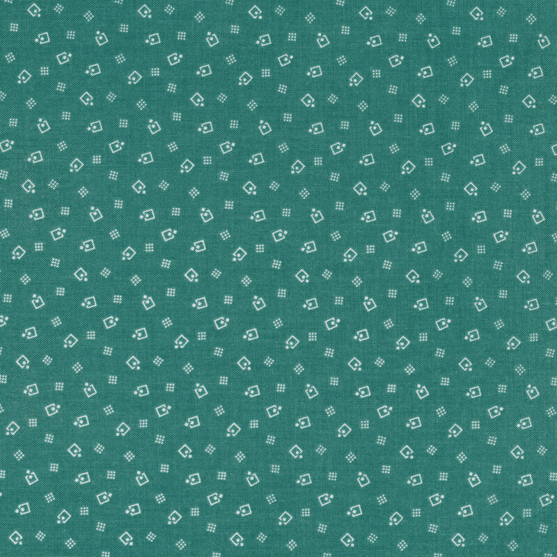 Fabric of scattered geometric designs on a dark teal background