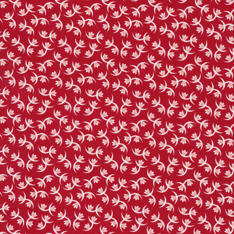 Fabric of tulips and crescents on a red background