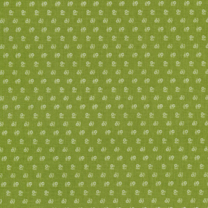 Fabric with an array of tiny white flowers on a green background