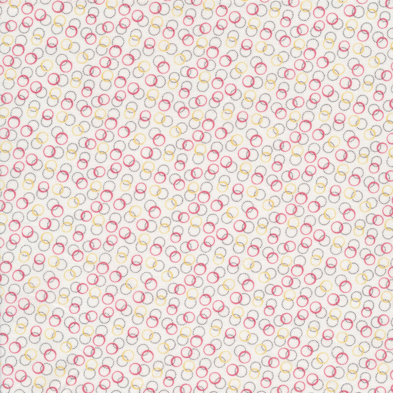 Fabric with a design of overlapping circles on a white background