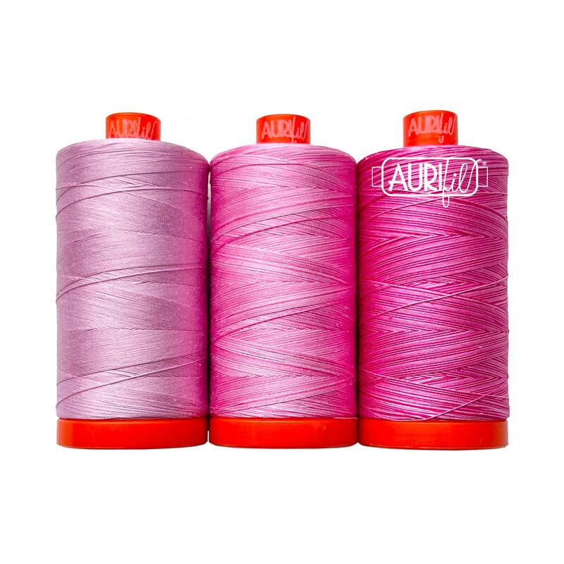Three pink thread spools from the water lily thread set