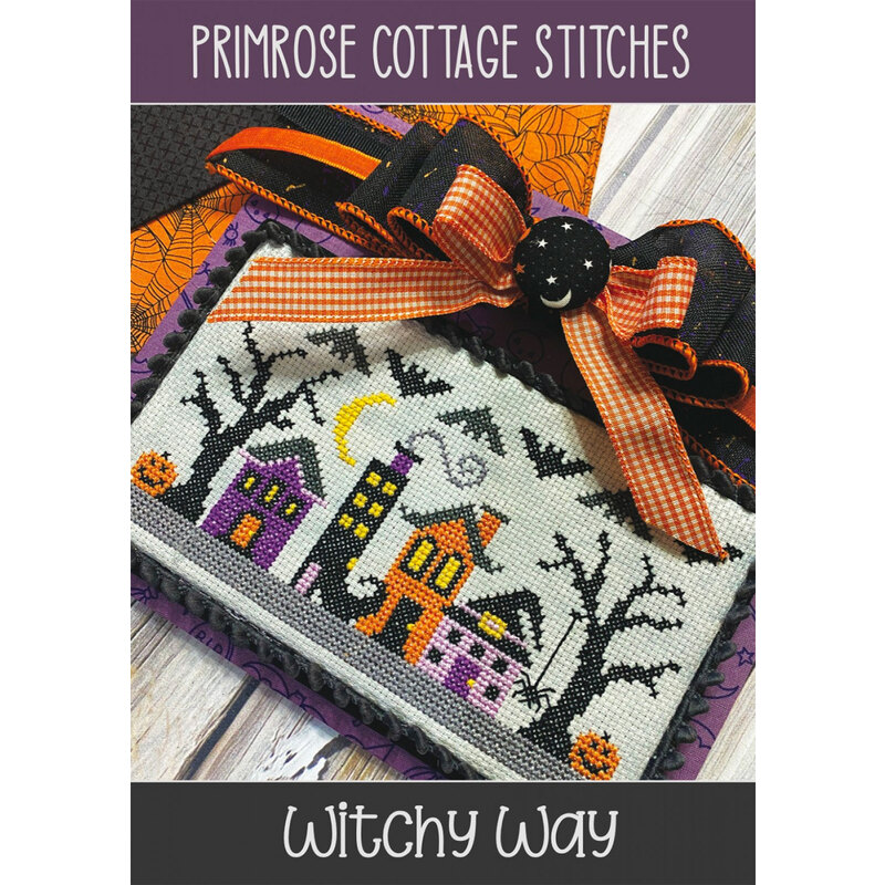 Photo of finished Witchy Way cross stitch pattern by Primrose Cottage Stitches with a festive bow on the embellished frame