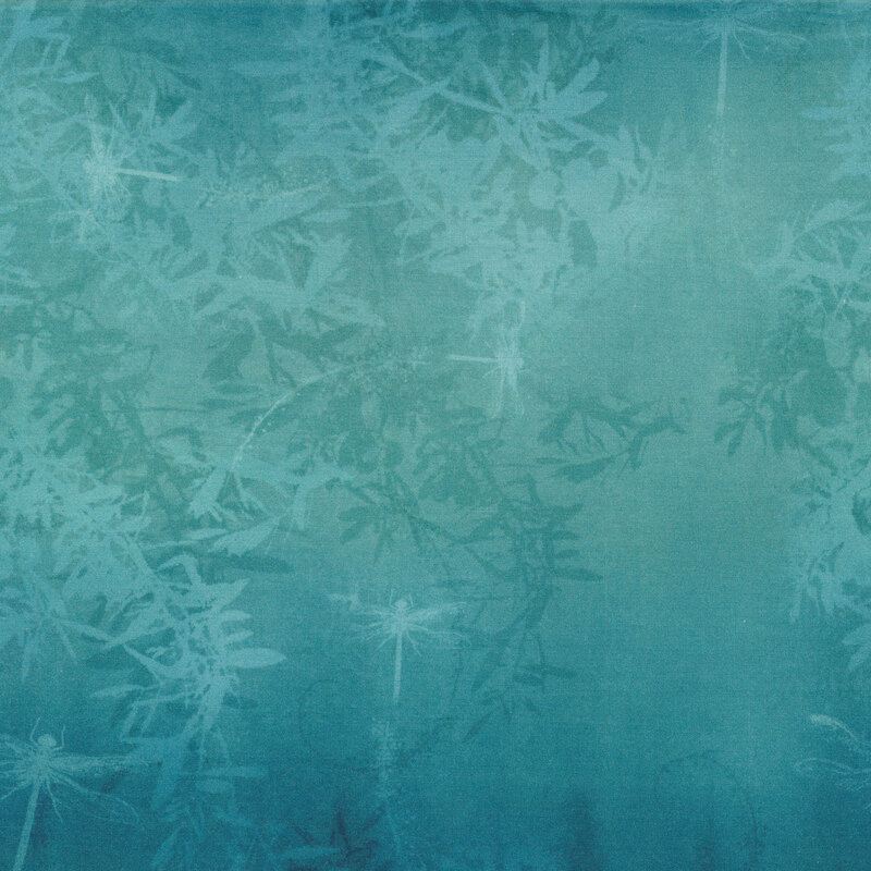 blue variegated fabric featuring dragonflies