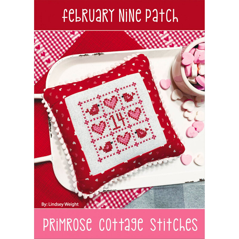 The front of the February Nine Patch Cross Stitch pattern by Lindsey Weight for Primrose Cottage Stitches showing the finished project.