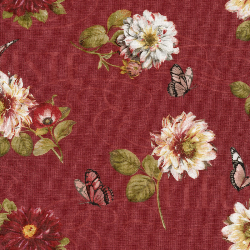 Fabric of flowers, butterflies, swirls, and words on a wine colored background