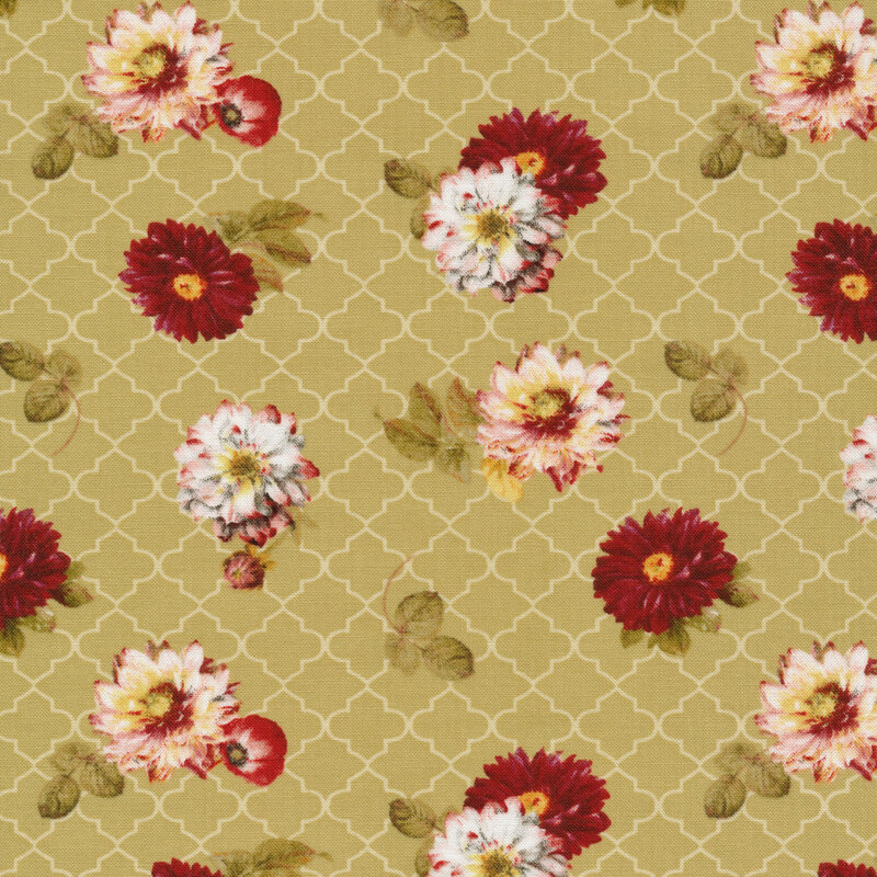 Fabric of scattered flowers and leaves on a green geometric background