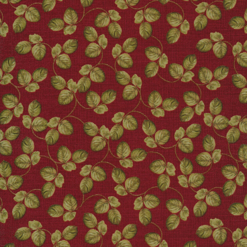Fabric of leaves and vines on a wine colored background