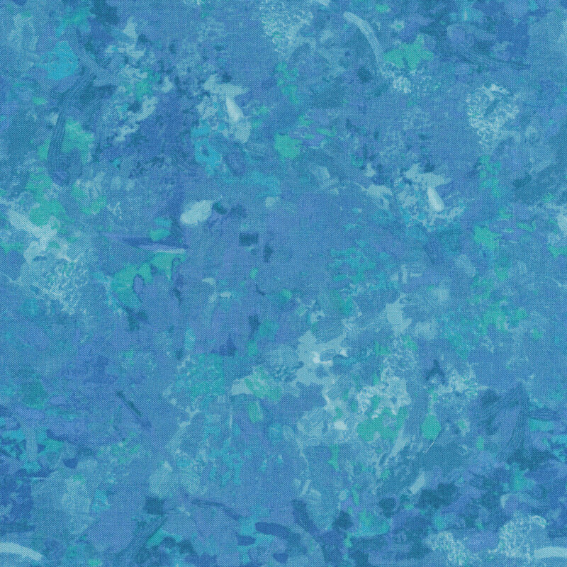 Fabric of a watercolor mottled print in a cerulean blue with aqua accents