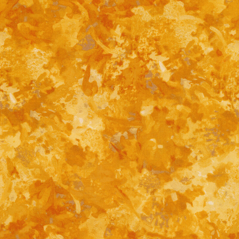 Fabric of a watercolor mottled print in a marigold color