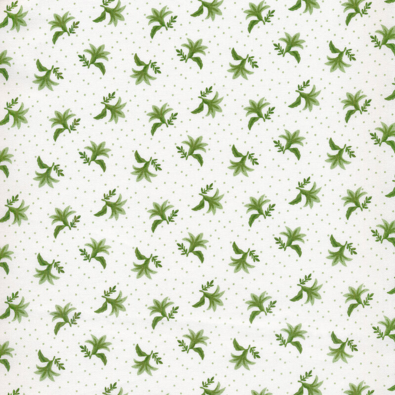 White fabric featuring tossed green flowers with green stems and small green polka dots all over