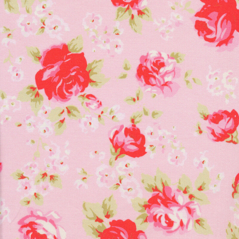 Pink fabric with bright red roses all over