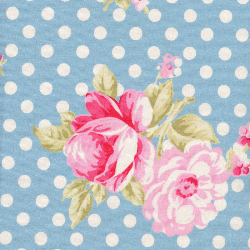 Blue fabric with large pink roses and white polka dots all over